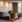 Comwell Rebild Bakker elegant lounge med sofaer og mursteinsvæg