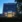 Comwell Hvide Hus Aalborg facade oplyst i aftenskumring