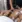 Hot stone massage behandling på ryg med varme sten